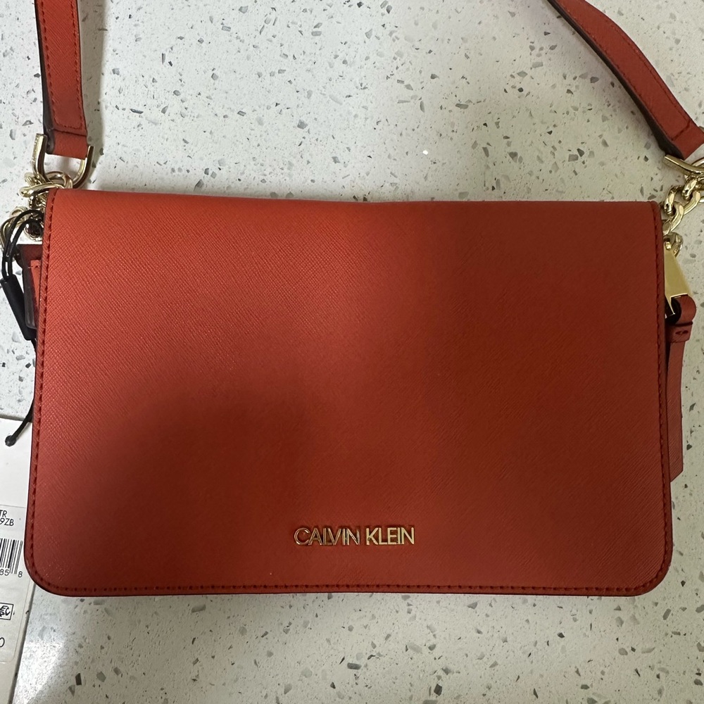 Calvin Klein Hayden Orange Crossbody Bag with Minimalist Design